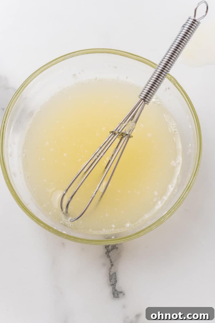 Fresh lemon juice in a bowl.