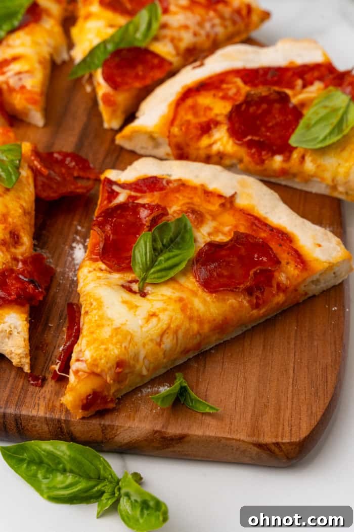 Slice of pepperoni cheese pizza.