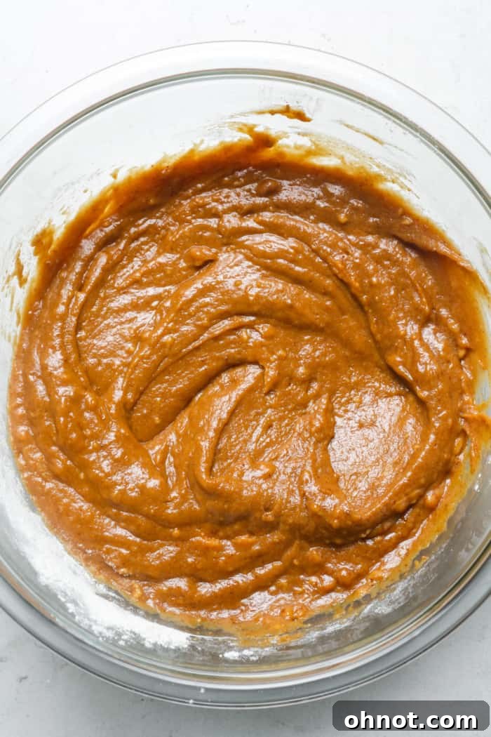 Orange batter in bowl.