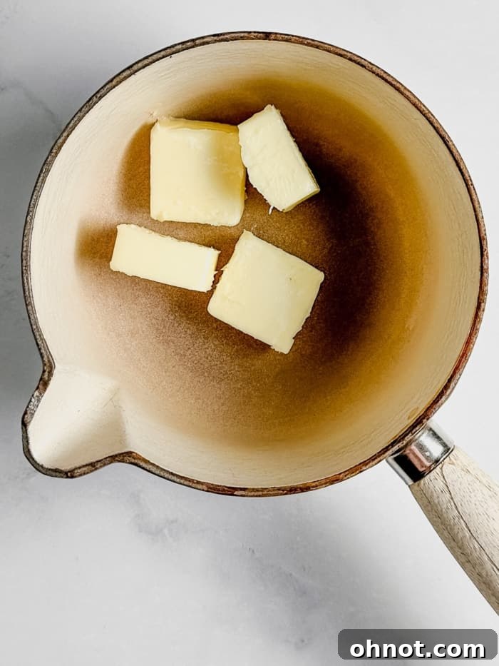 Butter in saucepan.
