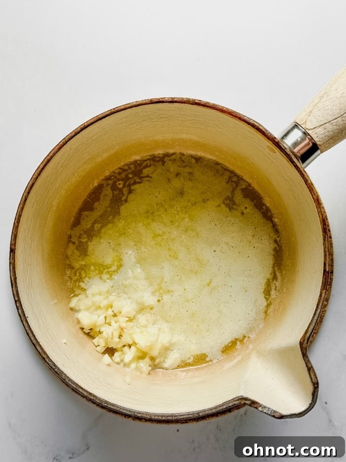 Melted butter in pan.