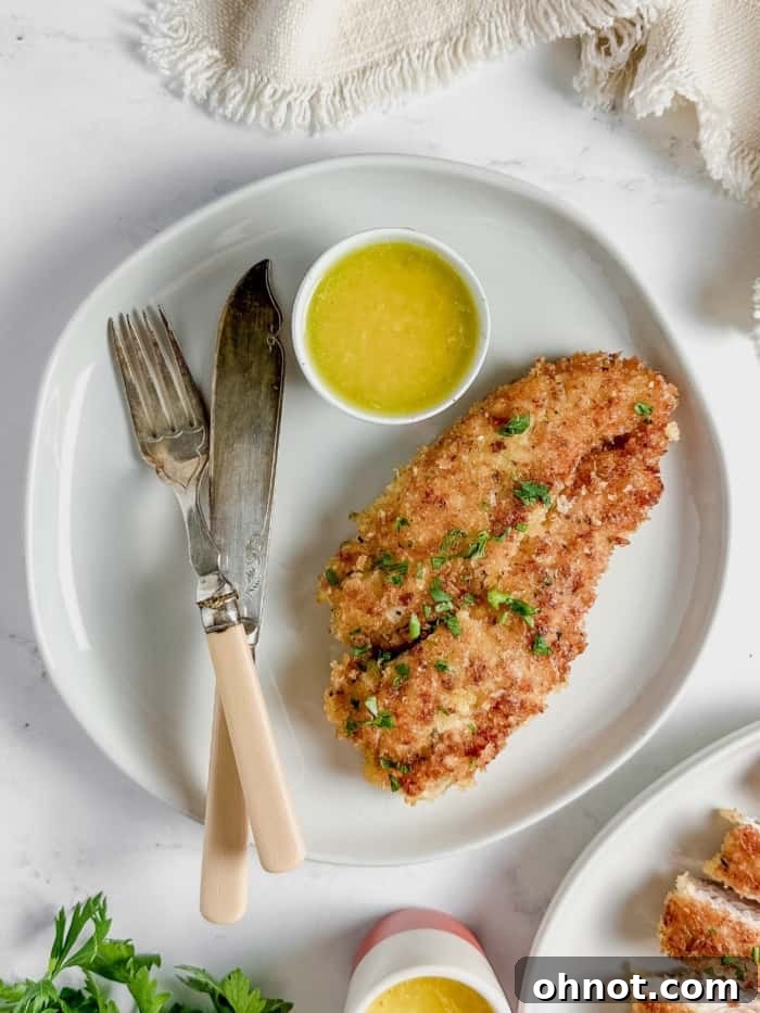 Crispy chicken on white plate.
