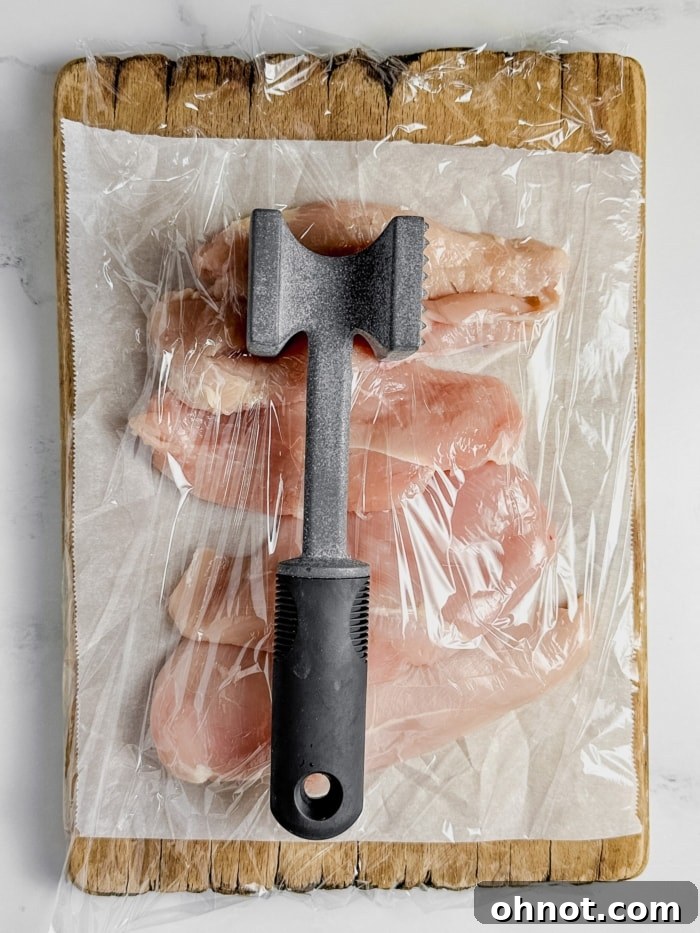 Meat mallet with chicken.