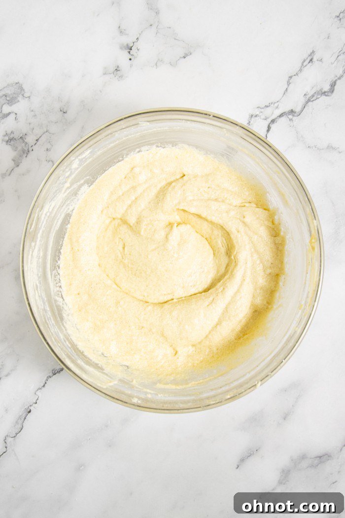 Vanilla-infused batter in a mixing bowl.