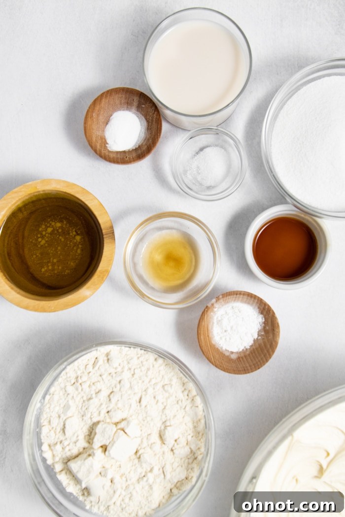A curated collection of dairy-free cupcake ingredients laid out on a kitchen counter.