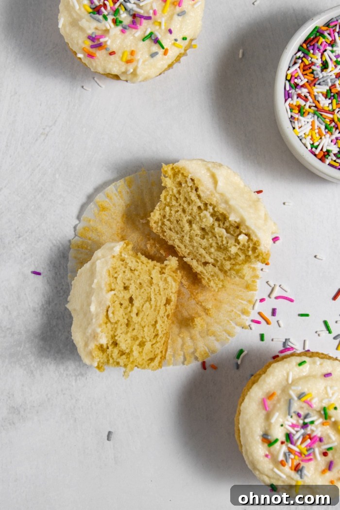 Deliciously moist dairy-free cupcakes topped with a swirl of vanilla frosting.