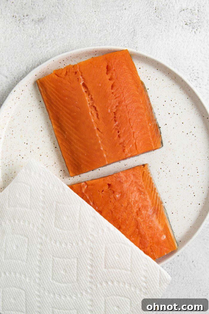 Salmon with paper towel.