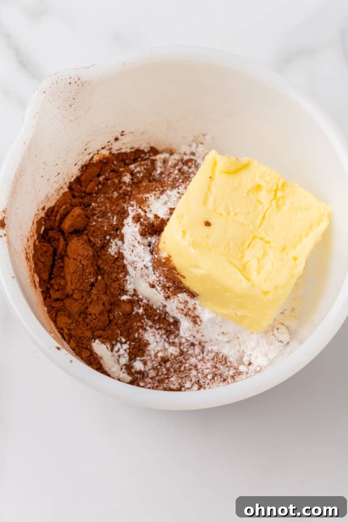 Butter and cocoa in bowl.