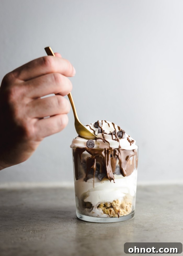 Jar with whipped cream and chocolate chips.