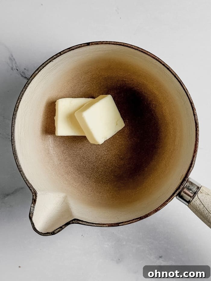 Butter in saucepan.