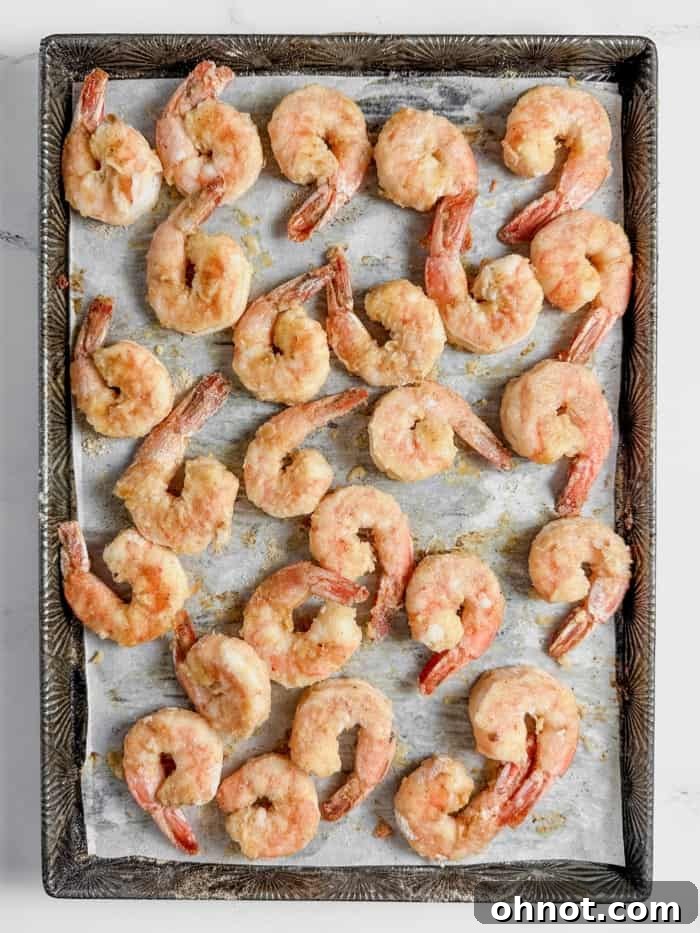 Cooked shrimp on pan.