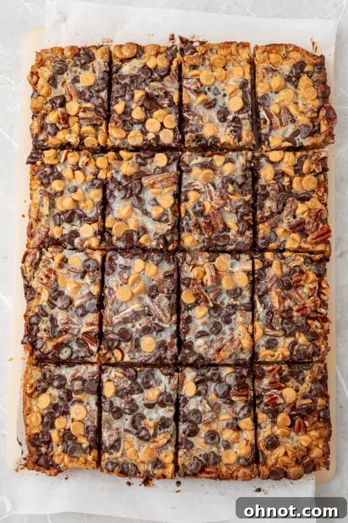 Neatly sliced magic cookie bars on a serving plate.