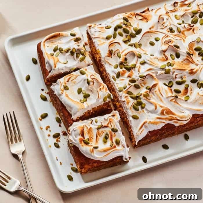 A delectable dessert with generous frosting, showcasing a smooth and appealing texture.