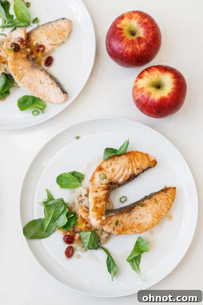 Gourmet salmon dish served with an apple walnut risotto.