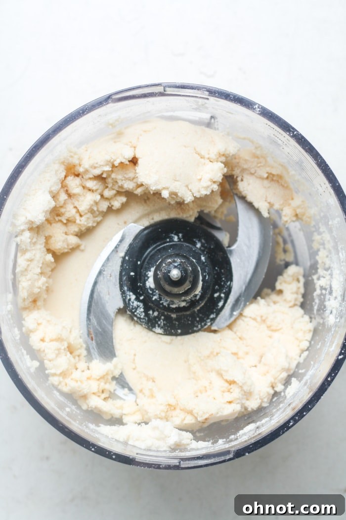 Cohesive dough formed in the food processor.