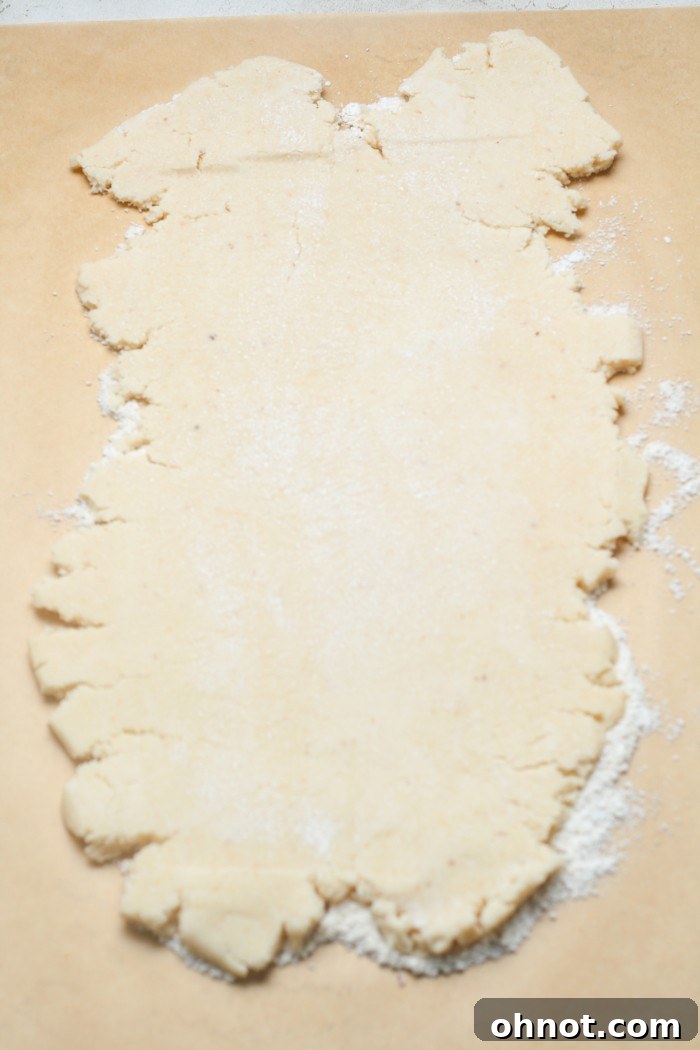 Rolled out gluten-free dough into a rectangular shape.