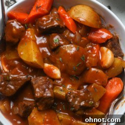 Dutch oven beef stew, garnished.