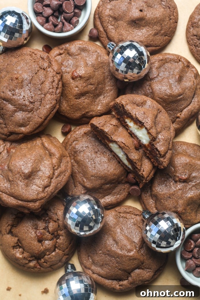 Gooey chocolate cheesecake cookies adorned with sprinkles.