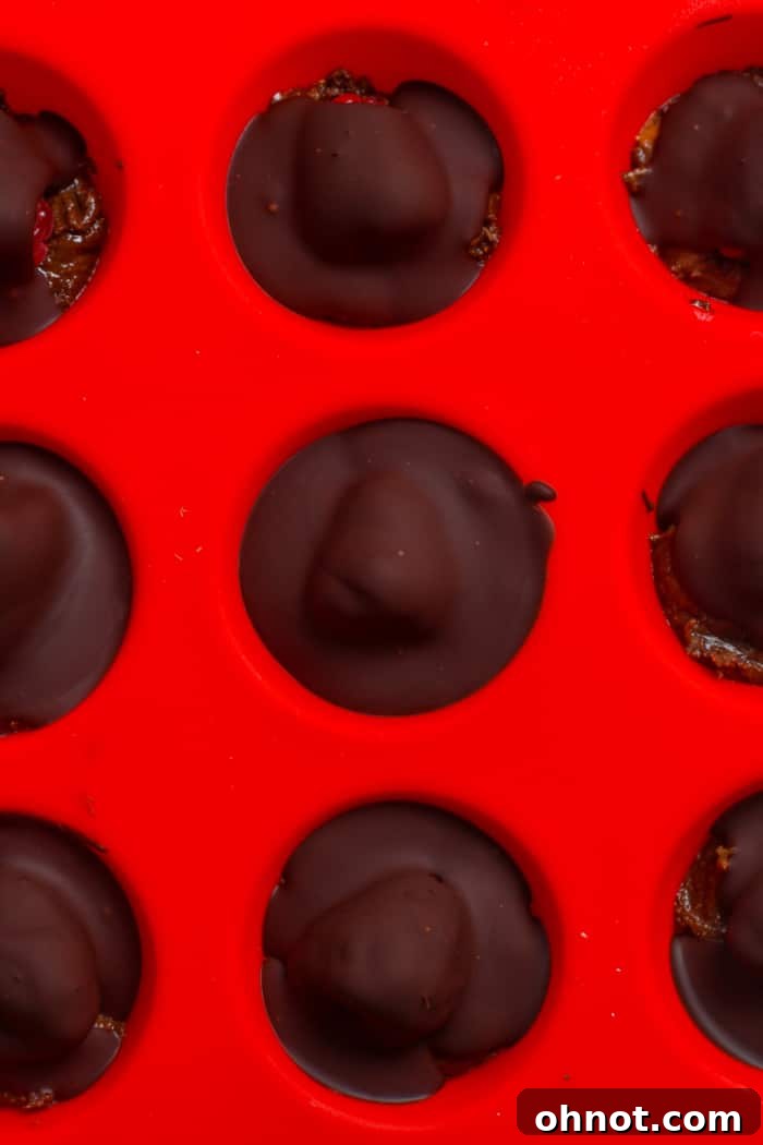 Red pan with hardened chocolate.