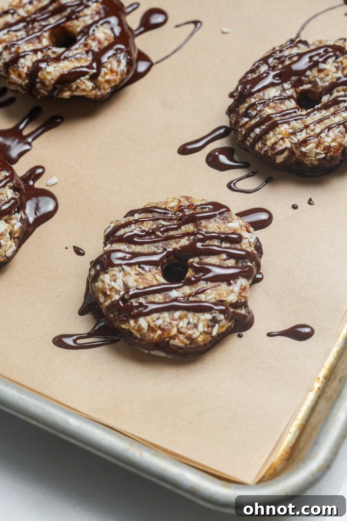 Chocolate drizzled over no-bake cookies.