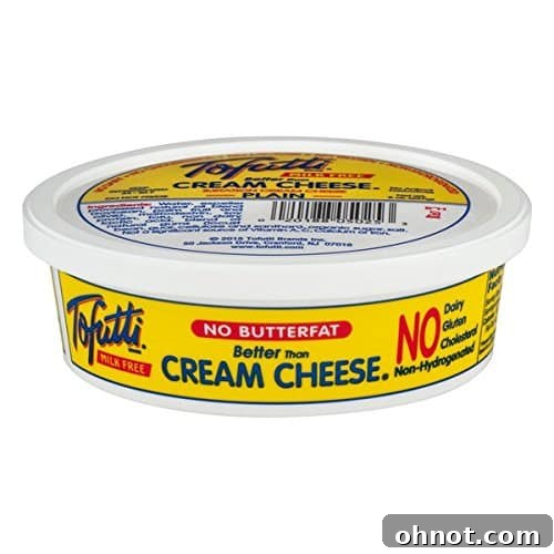 A tub of Tofutti Better Than Cream Cheese, showcasing its classic packaging and promise of a dairy-free alternative.