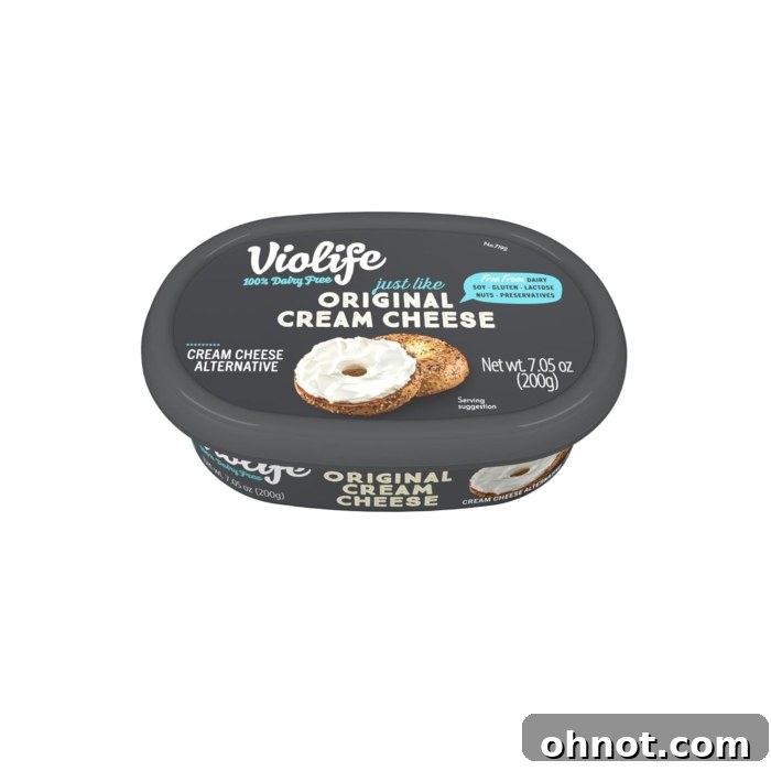 A tub of Violife vegan cream cheese, highlighting its original creamy flavor and plant-based ingredients.