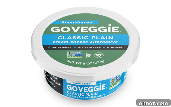 A package of Go Veggie plant-based cream cheese, indicating its dairy-free nature and delicious flavor.