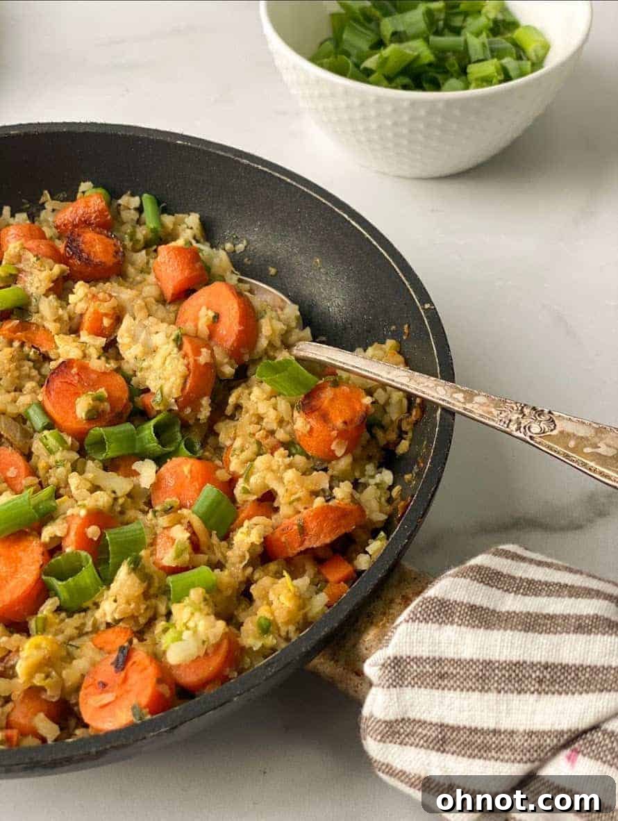 Close-up of Cauliflower Fried Rice in a skillet