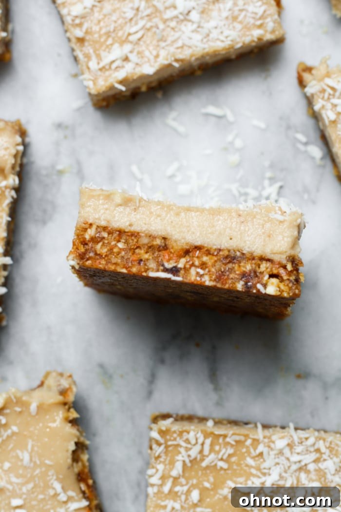 Close up view of perfectly sliced vegan cheesecake bars with a creamy filling and firm crust.