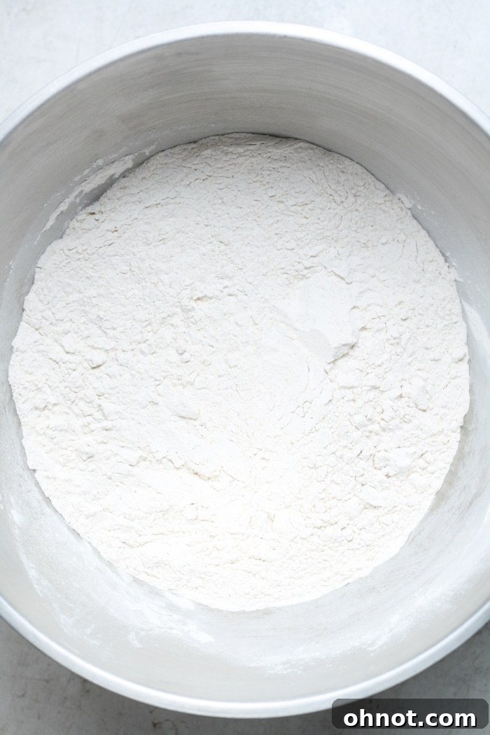 Dry gluten-free bread flour mixture in a mixing bowl.