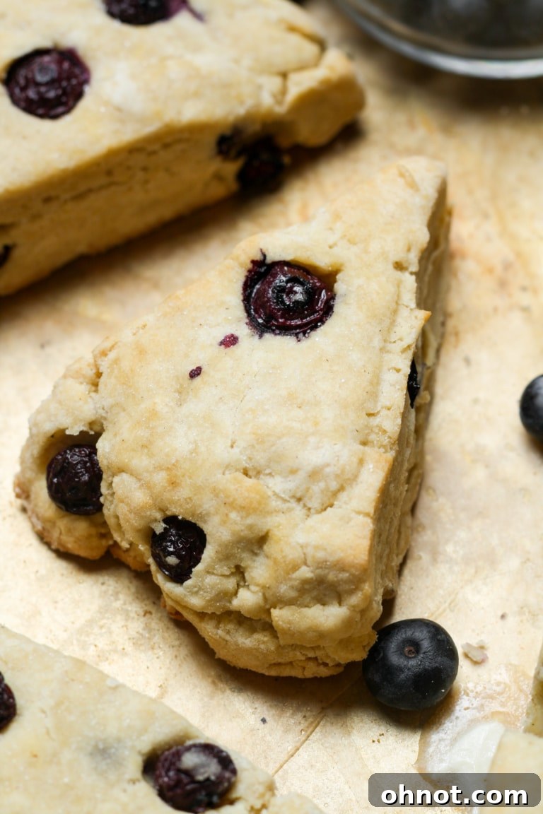 Homemade gluten-free blueberry scones with a flaky texture