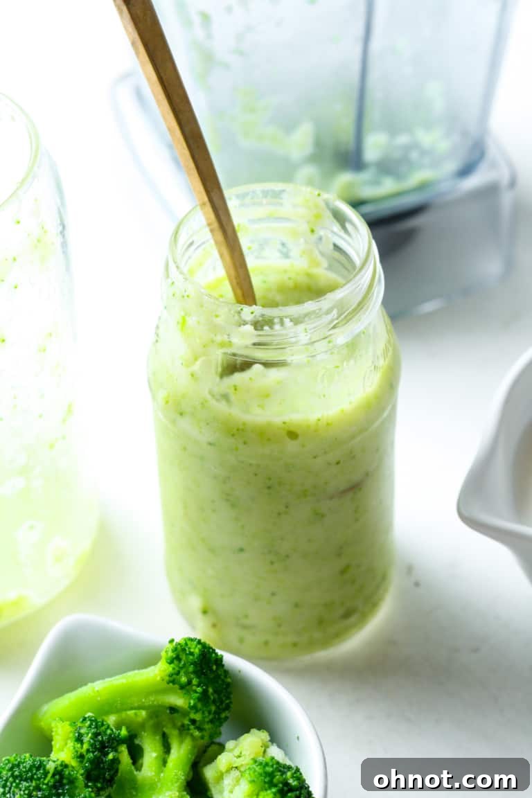 Vibrant green broccoli smoothie in a glass