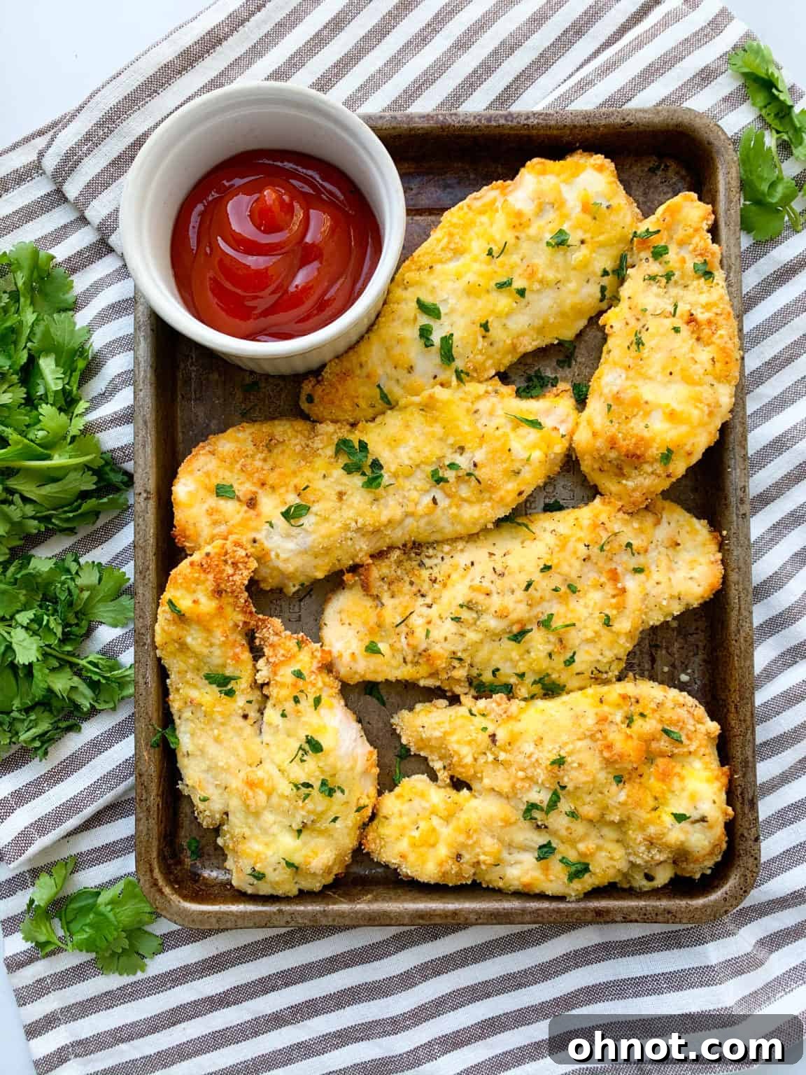 Crispy and savory Whole30 Chicken Tenders, a versatile Paleo recipe that can be cooked on the stovetop, oven, or air fryer.