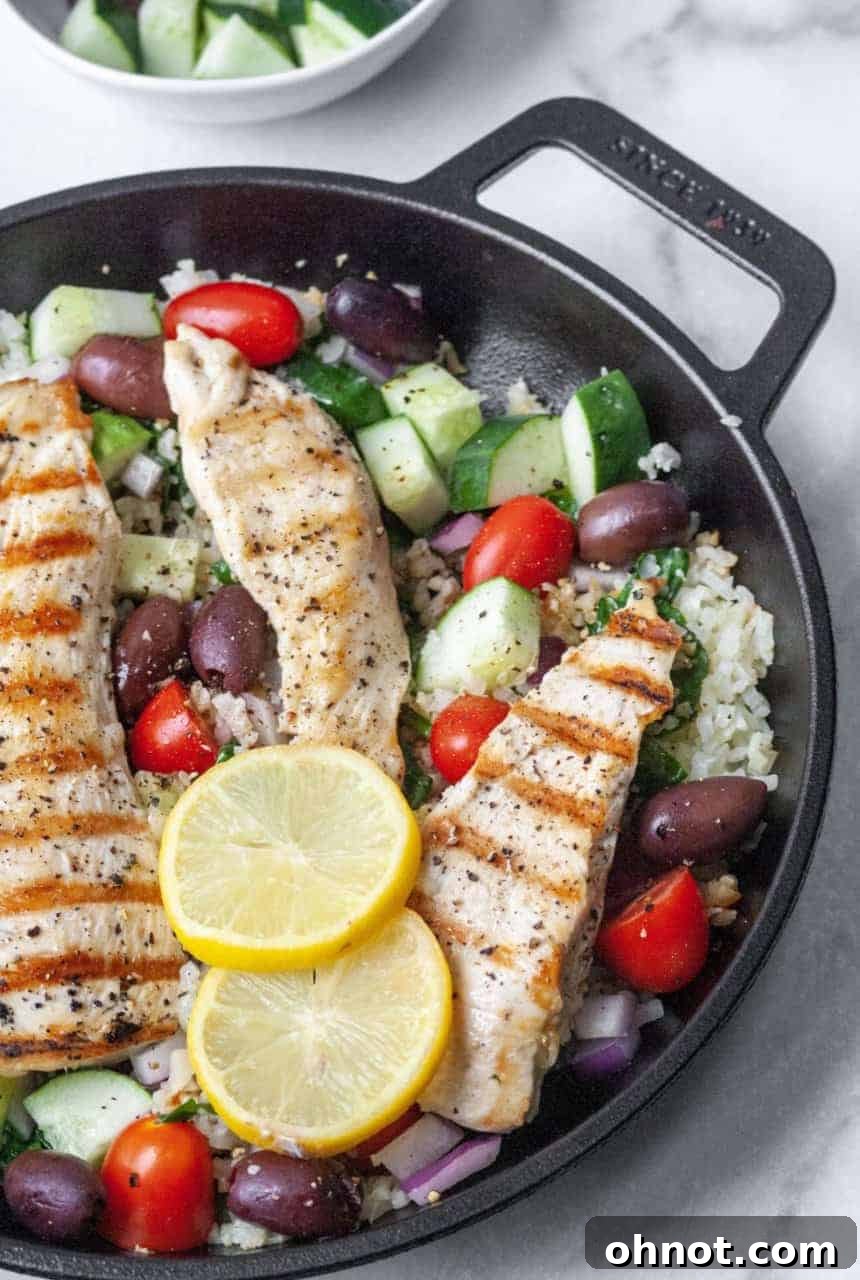 Vibrant Whole30 Greek Chicken Skillet, featuring tender chicken, fresh vegetables, and Mediterranean flavors.