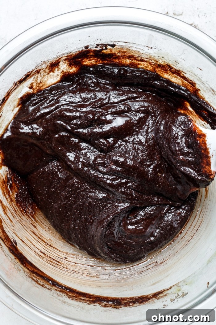 Thick brownie batter showing its rich consistency.