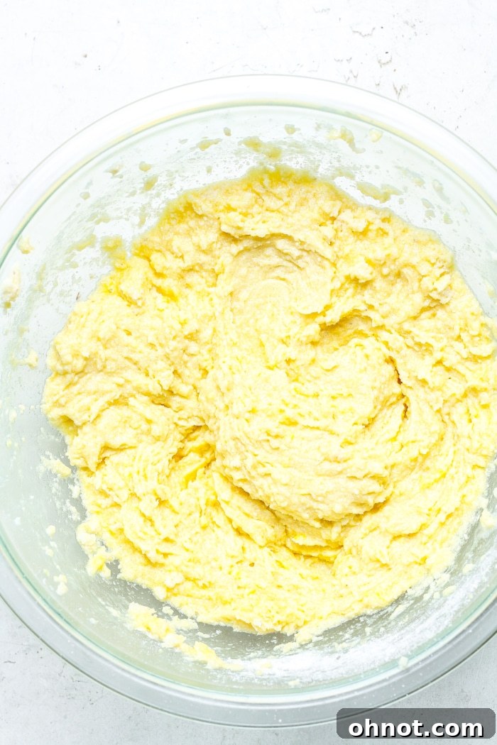 Wet ingredients being mixed into the batter.