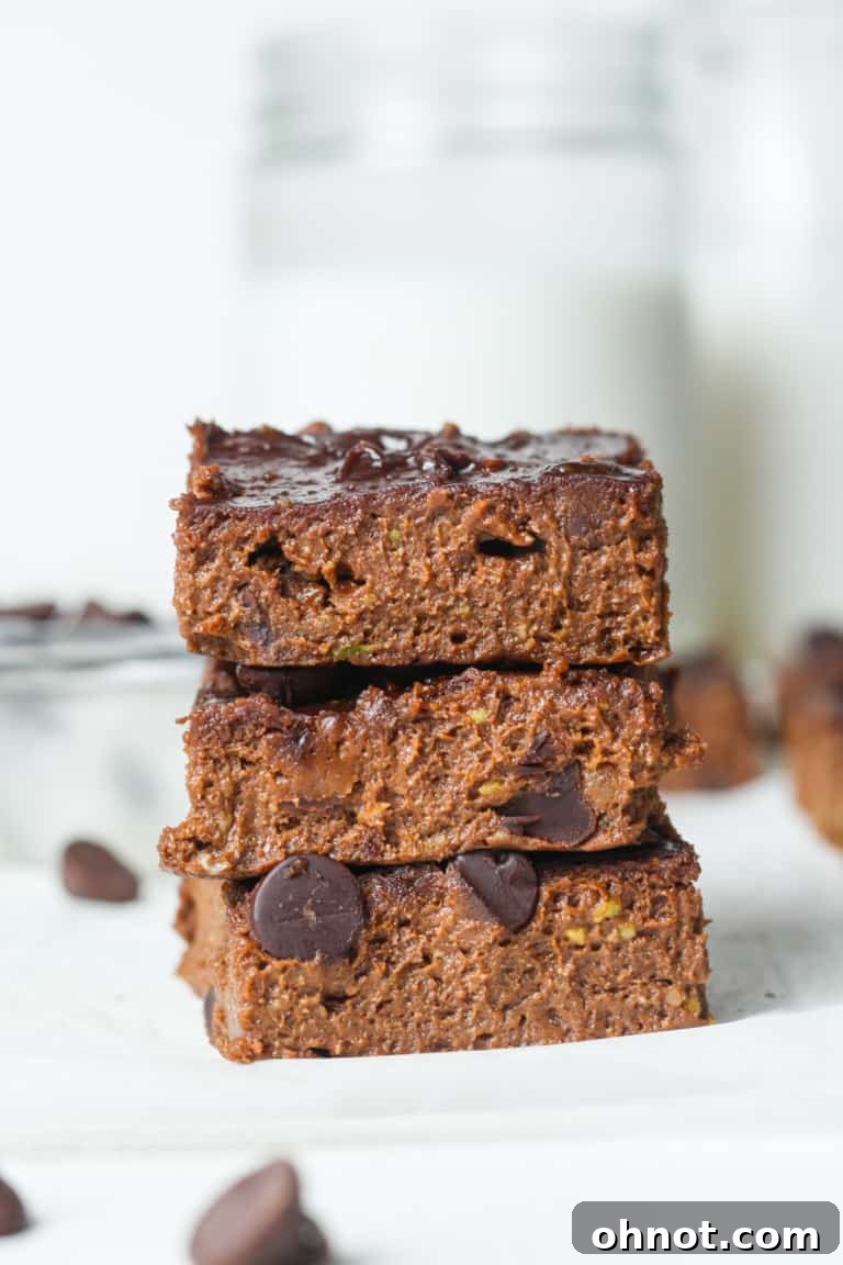 Close-up of a rich avocado brownie, dark and fudgy.