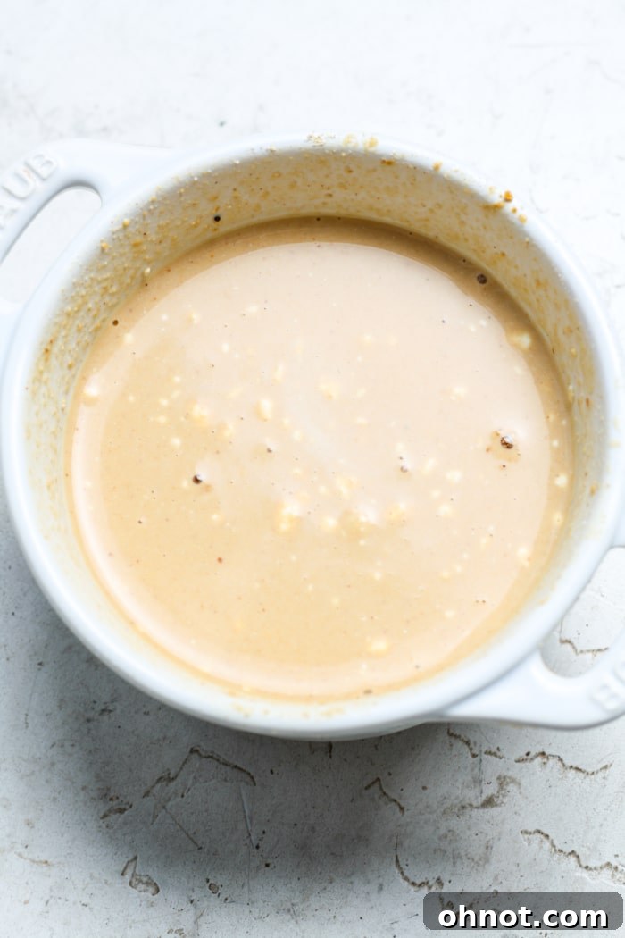 Creamy peanut butter mixture in bowl.
