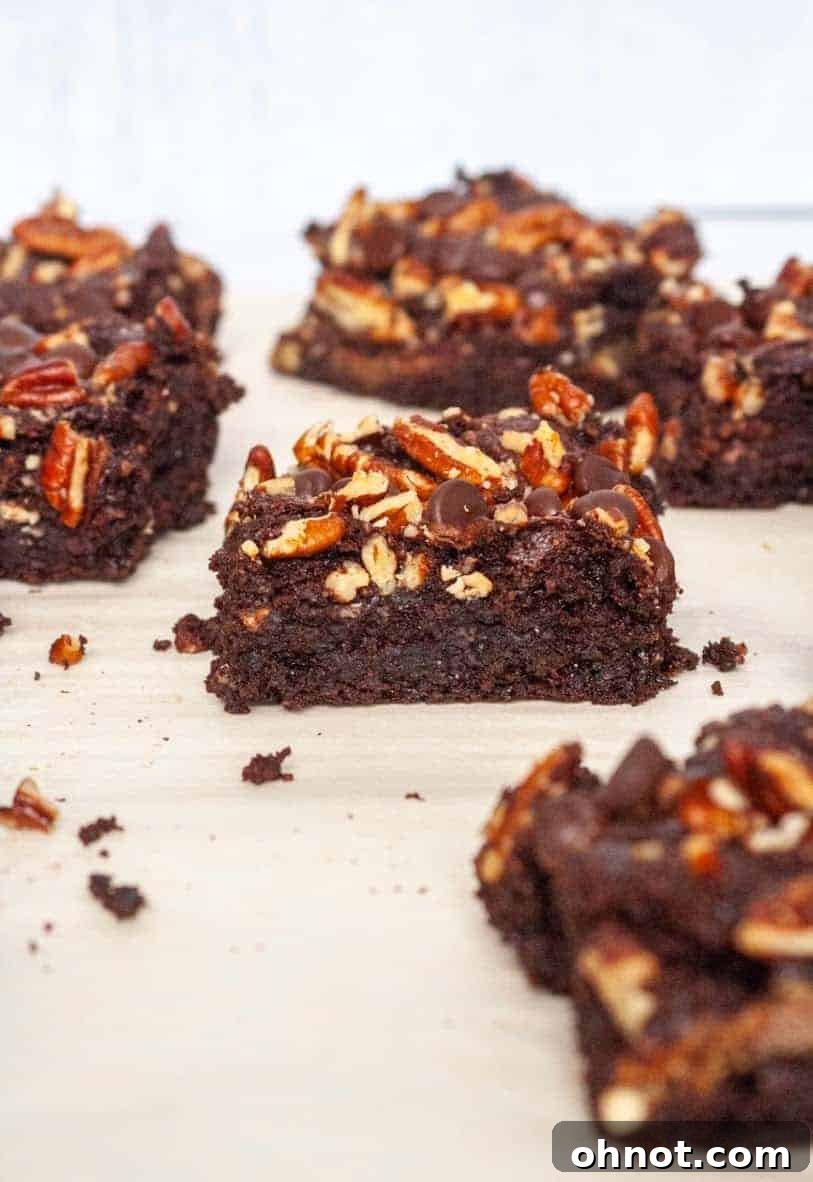 Decadent layered caramel pecan brownies, perfectly fudgy