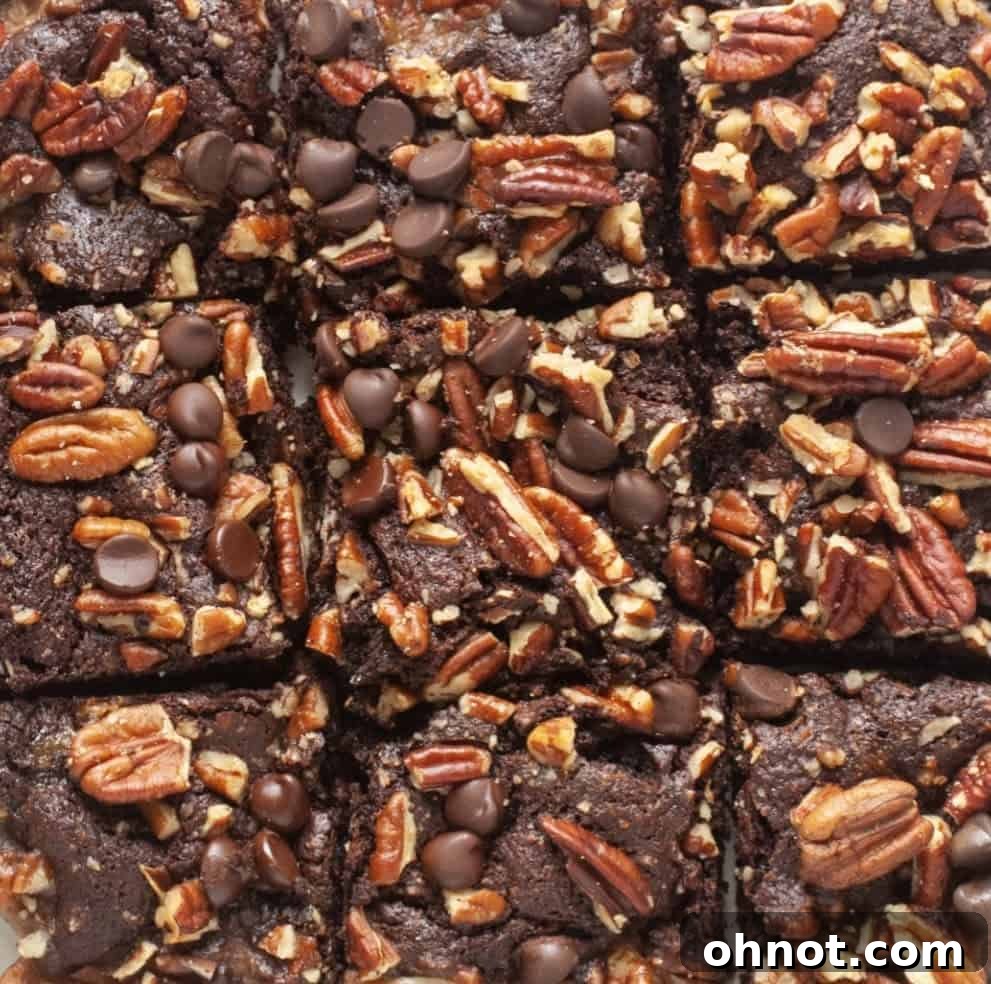 Deliciously moist caramel pecan brownie square with a drizzle of caramel