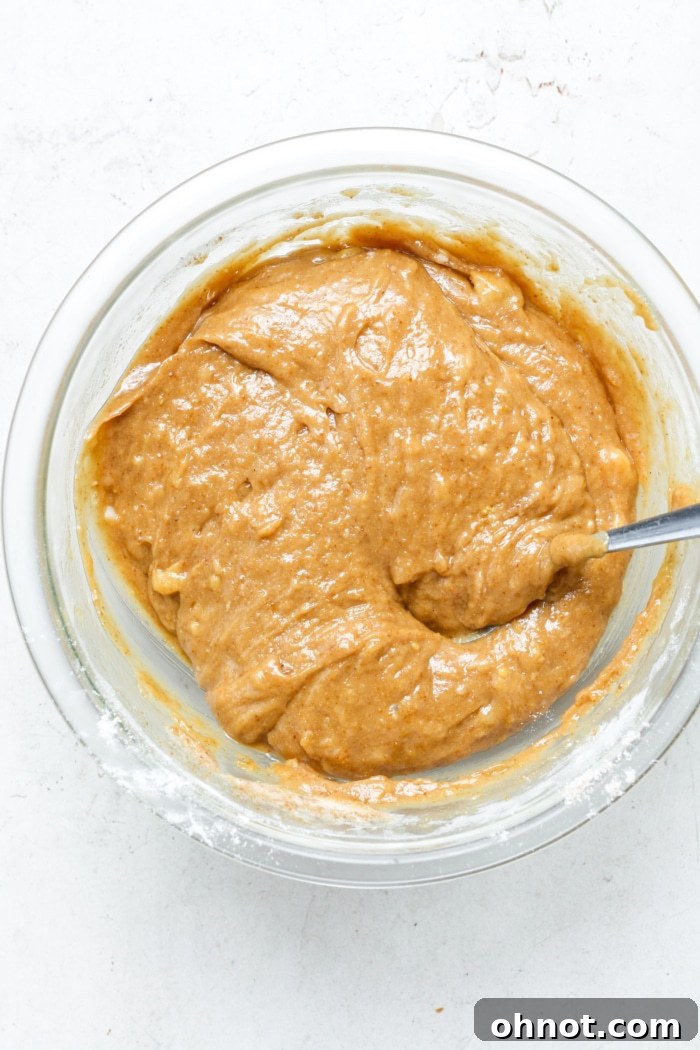 Golden-brown bread batter in a mixing bowl.