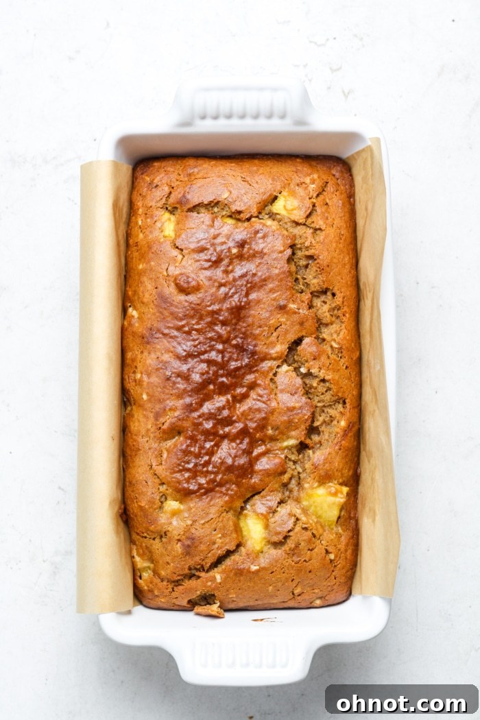 Freshly baked pineapple banana bread, golden brown and perfectly risen.