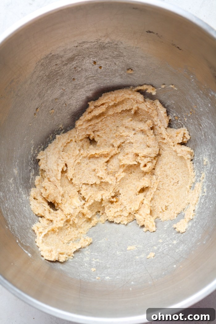 Sugary butter in mixing bowl.
