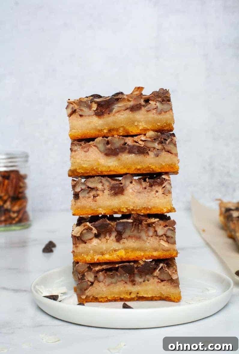 Delicious Vegan and Paleo Magic Cookie Bars with multiple layers
