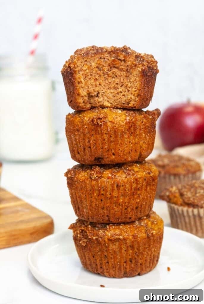 A stack of Paleo almond flour apple muffins, ready to be enjoyed