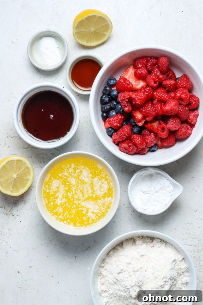 A visual display of all ingredients required to make strawberry crumble bars, neatly arranged.