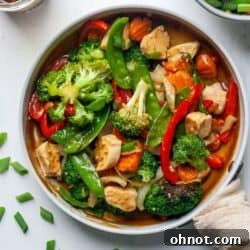 Paleo chicken stir fry with vegetables in skillet