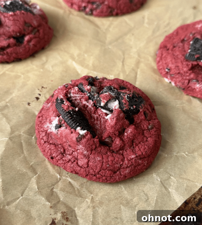 A plate of freshly baked Red Velvet Oreo cookies, showcasing their vibrant red color and delicious texture.