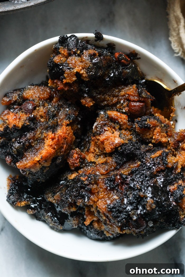 A bowl filled with individual portions of warm, fudgy brookies.