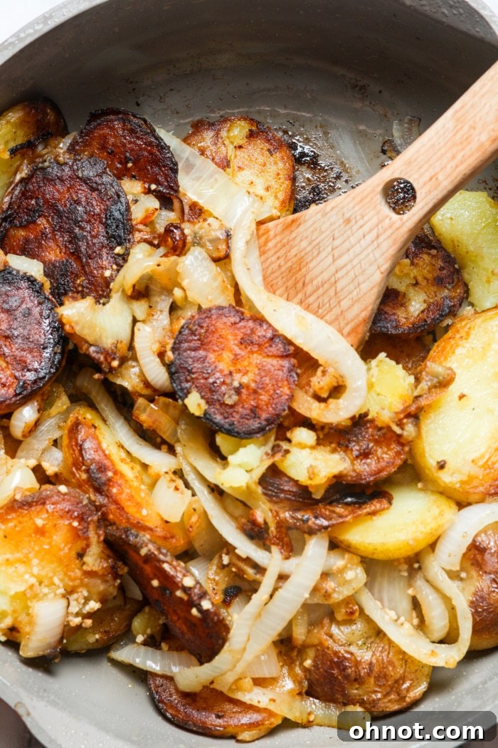 Close-up of charred onions with potatoes